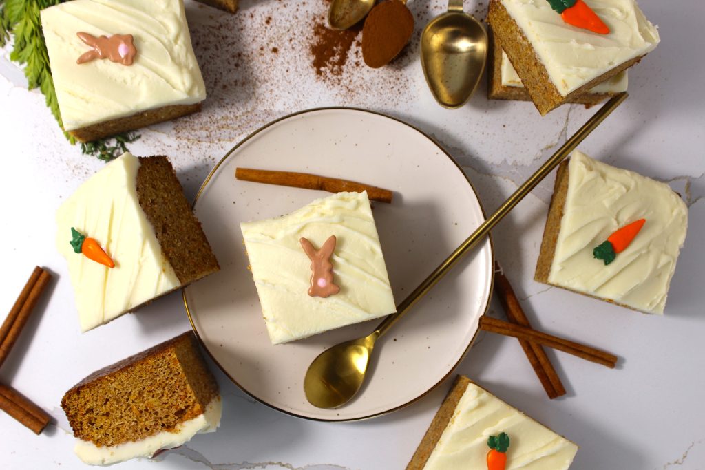 cinnamon sticks on the side of carrot cake bars
