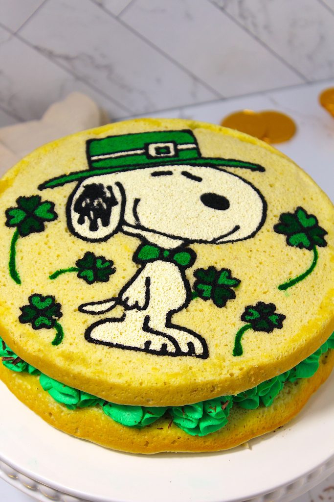 finished product of two layers of sponge cake with a whipped cream filling