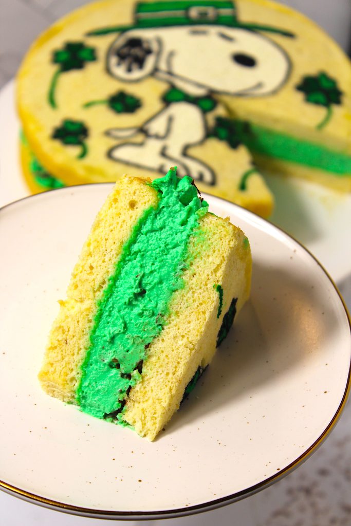 up close of the sponge cake with green whipped cream